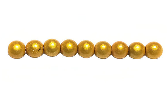 Perles magiques 6 mm dorées